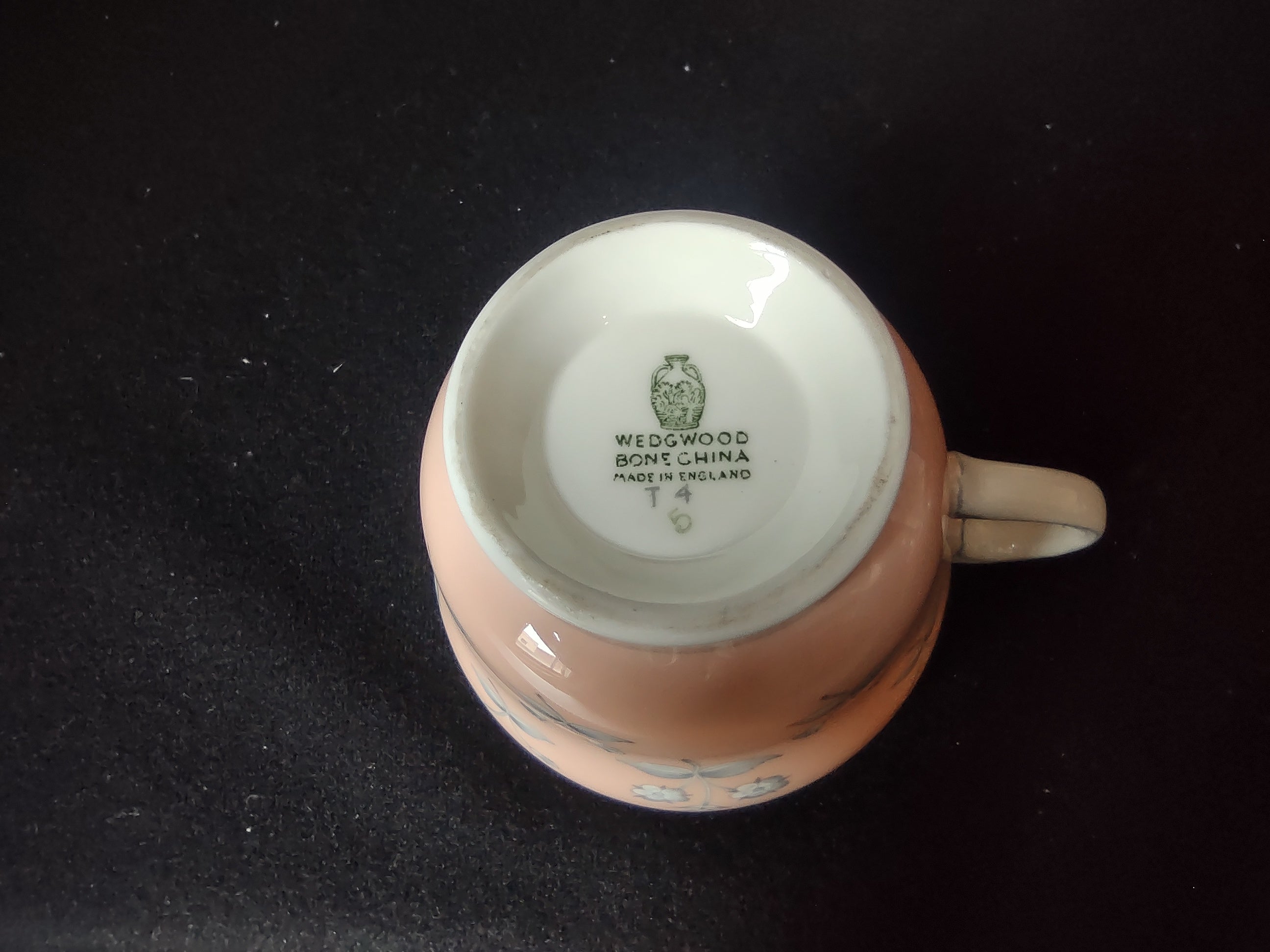 Wedgwood Pimpernel Pink Teacup and Saucer Green Stamp (lot 2765)