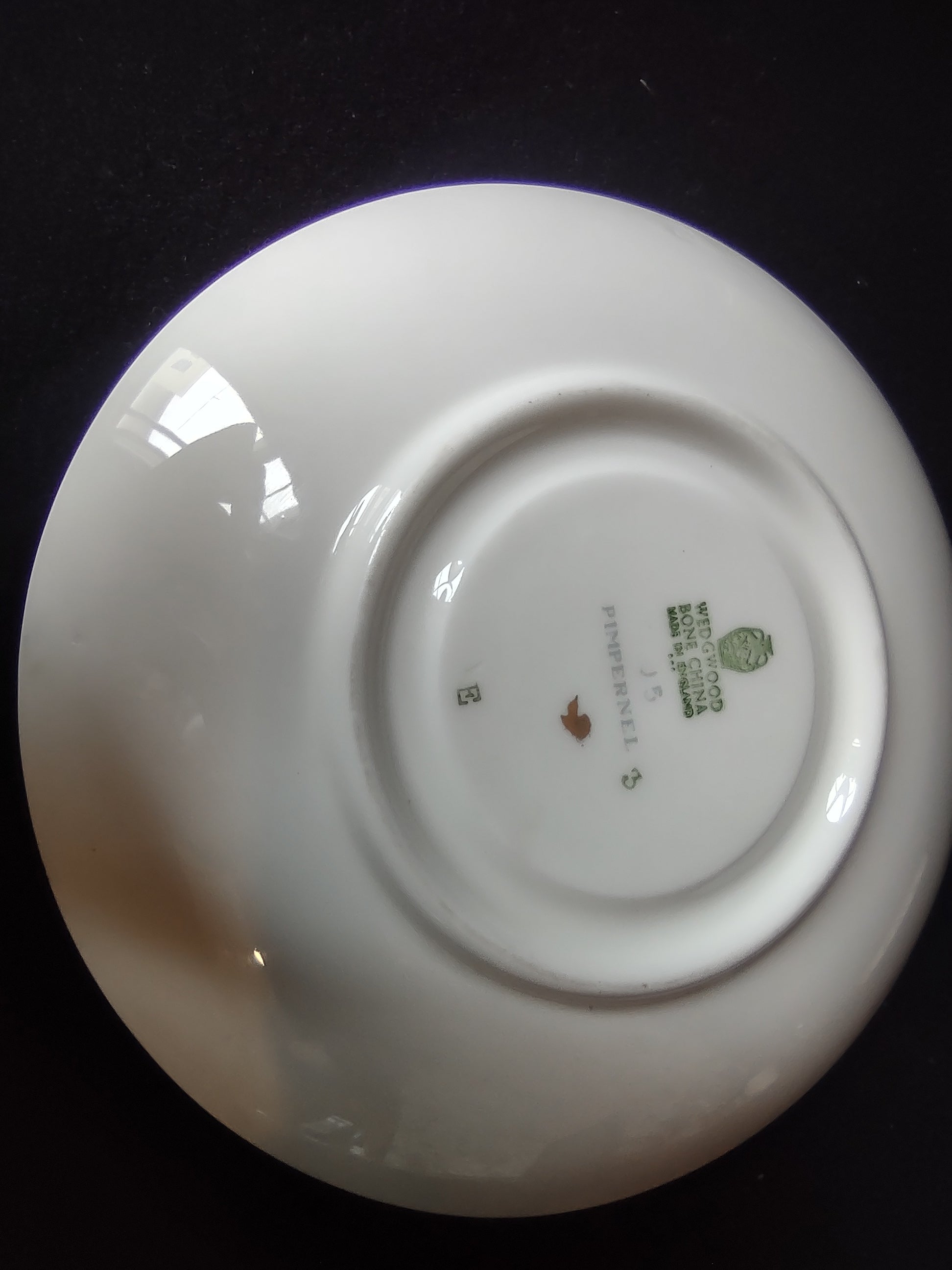 Wedgwood Pimpernel Pink Teacup and Saucer Green Stamp (lot 2765)
