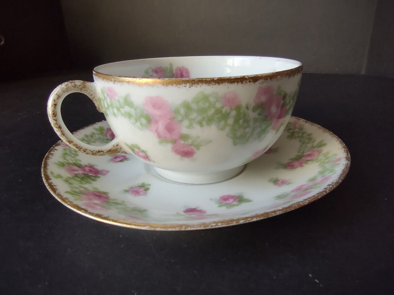 JP France Porcelain for T.G. Evans Tea Cup and Saucer Rose Garland (lot 833)