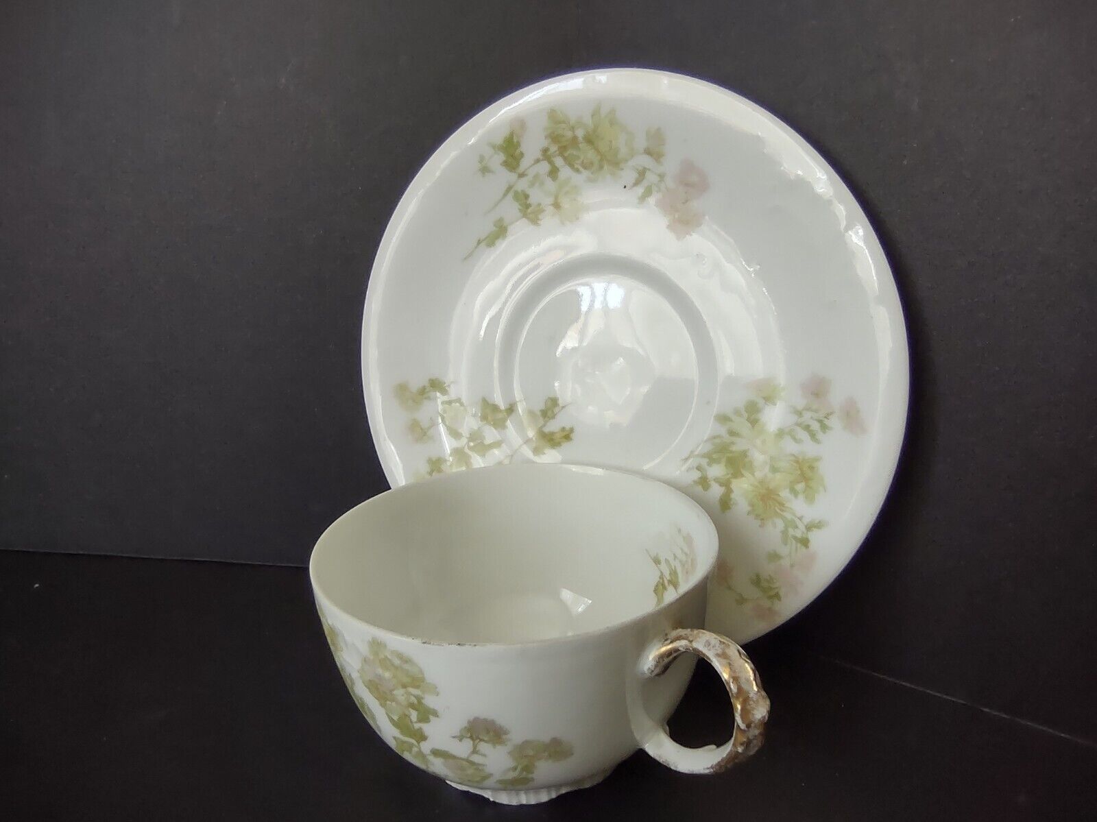 JP Limoges France Porcelain Teacup & Saucer Green Flower Gold Handle (lot 734)