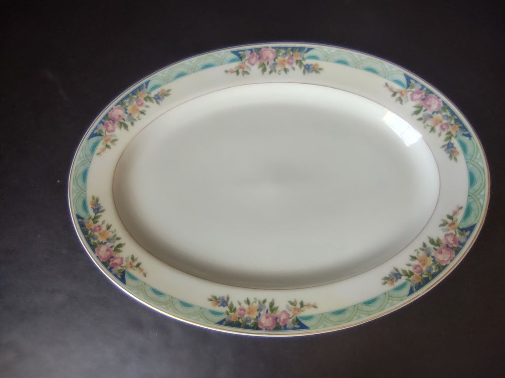 Haviland Limoges Massachusetts Tea Cup with Saucer Blue Floral (lot 937)