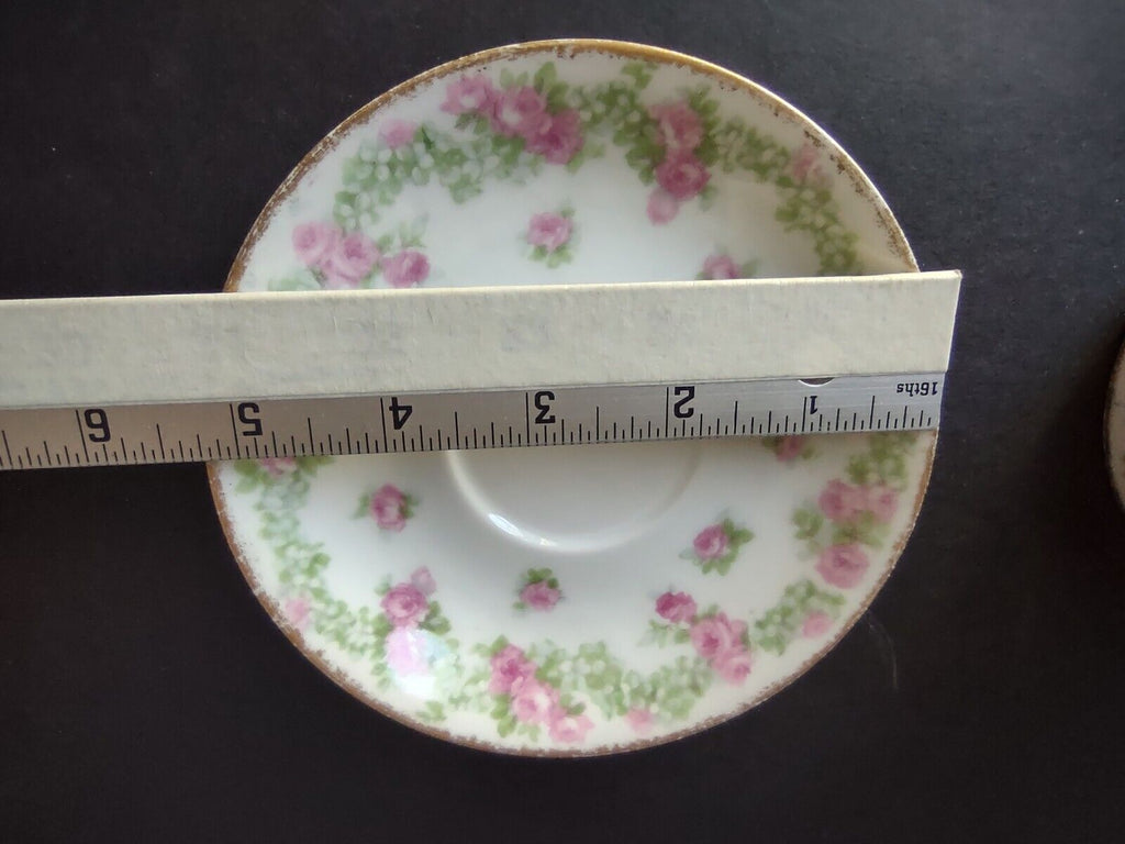 JP France Porcelain for T.G. Evans Tea Cup and Saucer Rose Garland (lot 833)