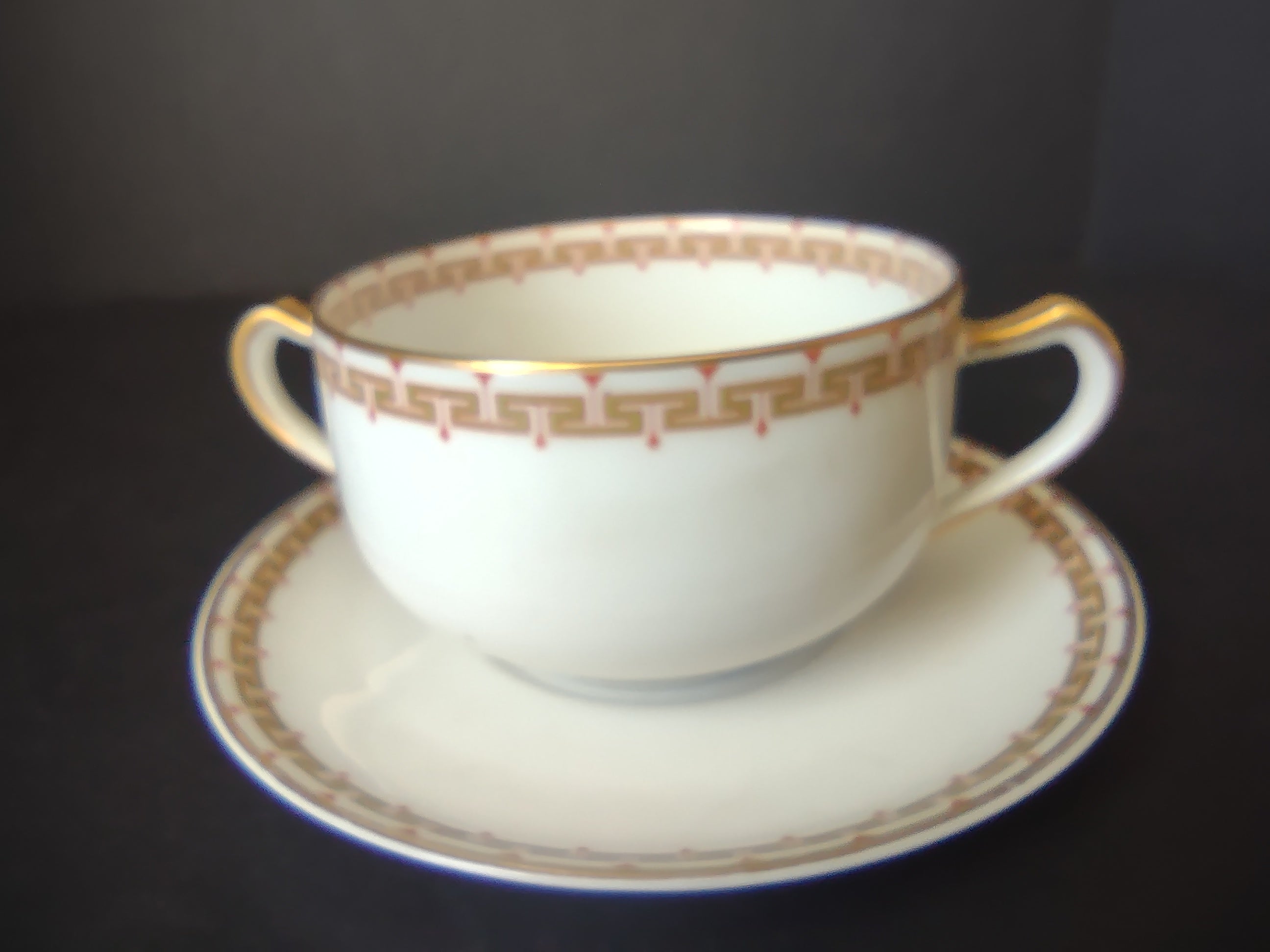 Haviland Limoges Bouillon Cup and Saucer Green Red Design (lot 1063)