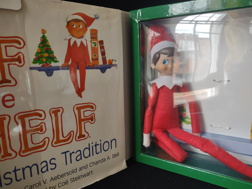 Set Books and Blue Eyes Brown Hair Elf and Naughty Nice Board Game (lot 1724)