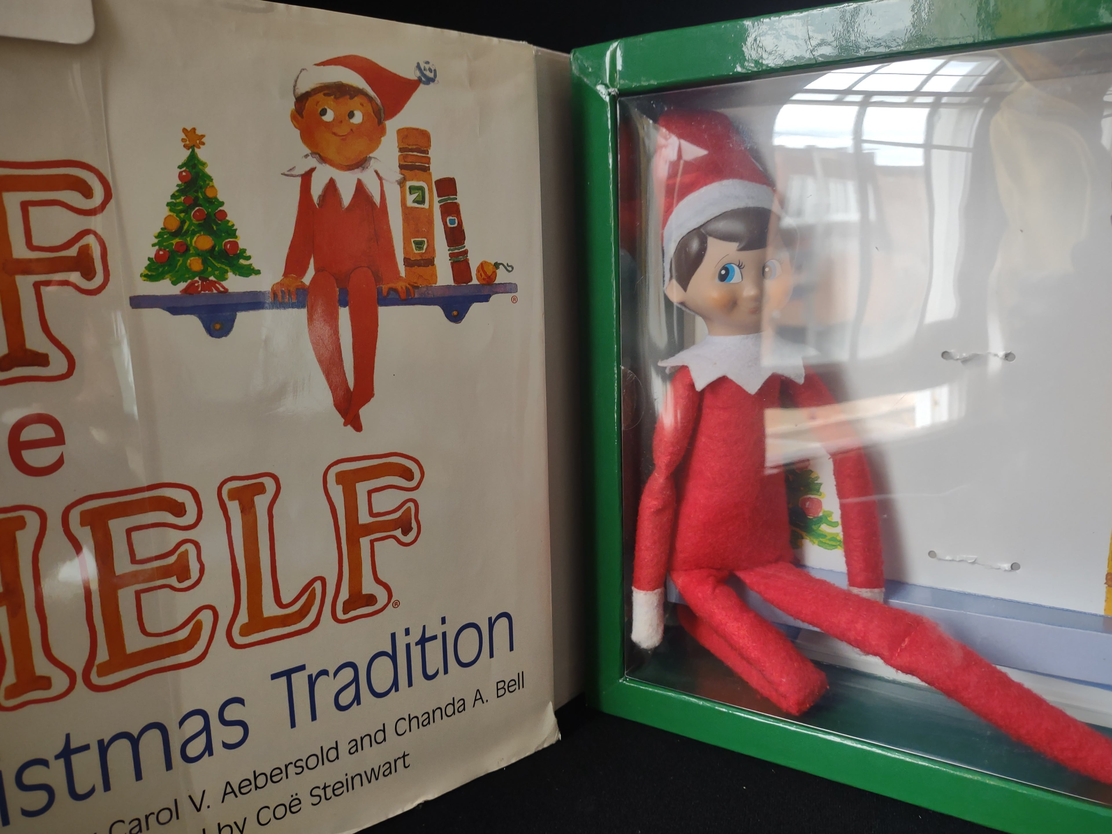 Set Books and Blue Eyes Brown Hair Elf and Naughty Nice Board Game (lot 1724)