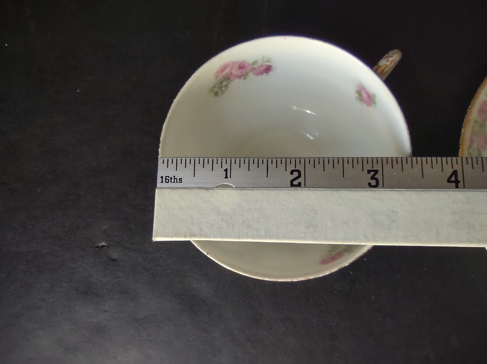 JP France Porcelain for T.G. Evans Tea Cup and Saucer Rose Garland (lot 833)