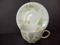 JP Limoges France Porcelain Teacup & Saucer Green Flower Gold Handle (lot 734)