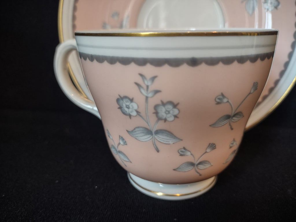 Wedgwood Pimpernel Pink Teacup and Saucer Green Stamp (lot 2765)