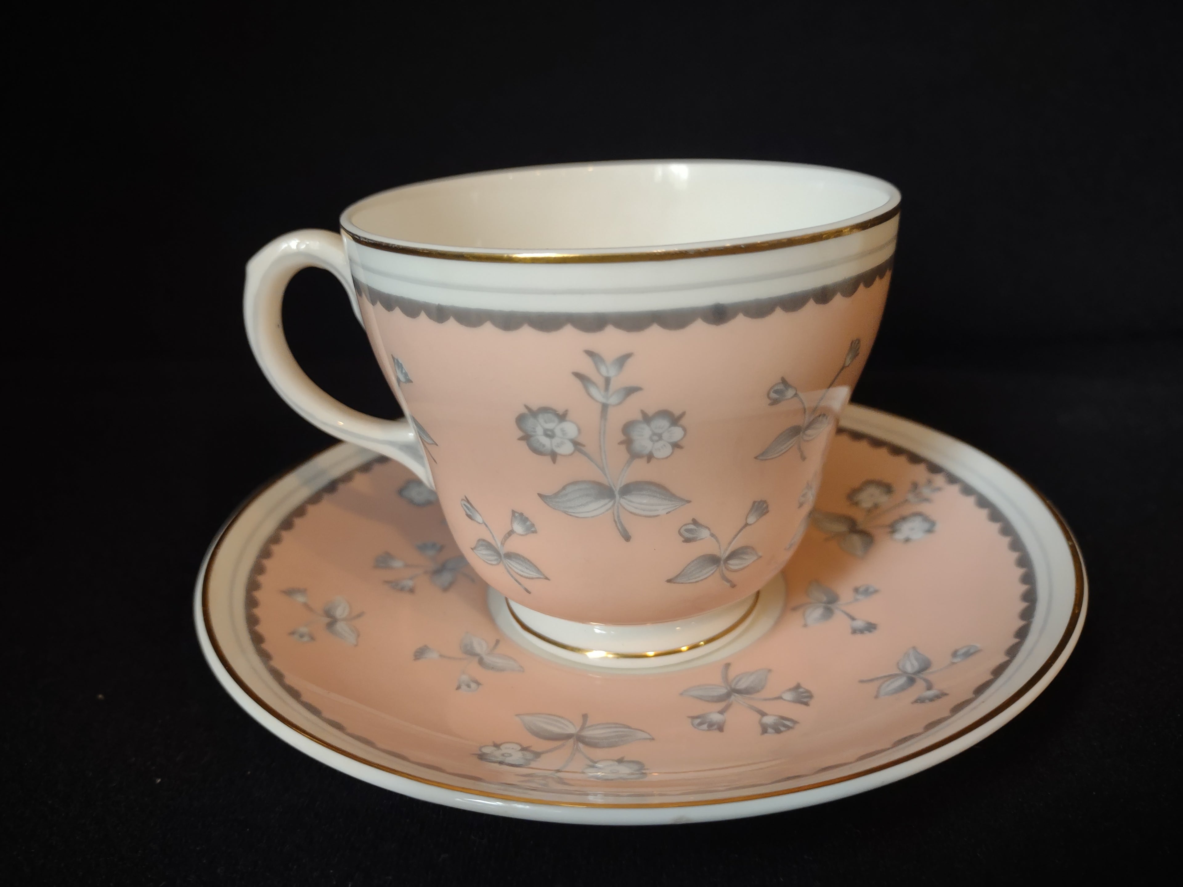 Wedgwood Pimpernel Pink Teacup and Saucer Green Stamp (lot 2765)