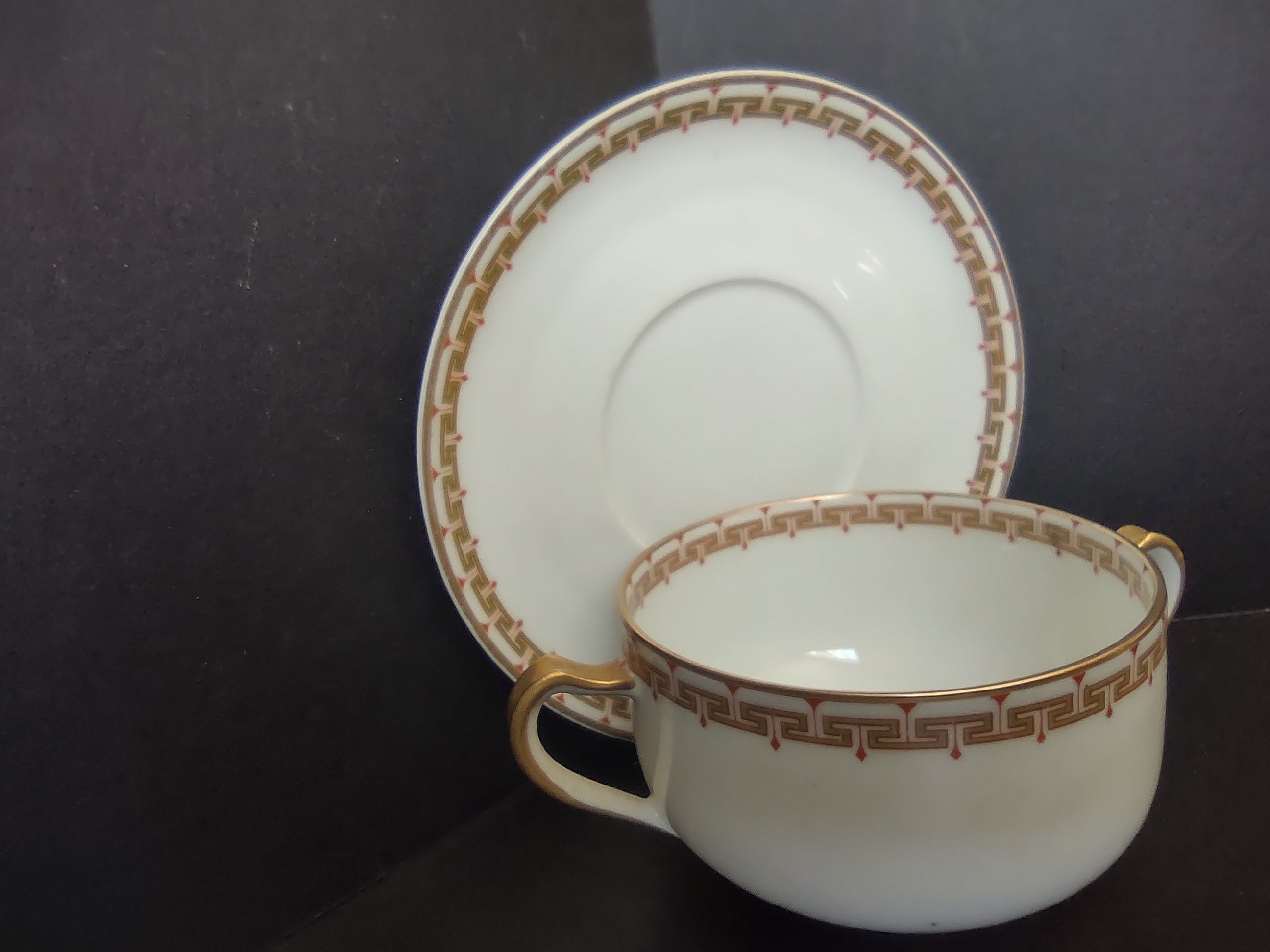 Haviland Limoges Bouillon Cup and Saucer Green Red Design (lot 1063)