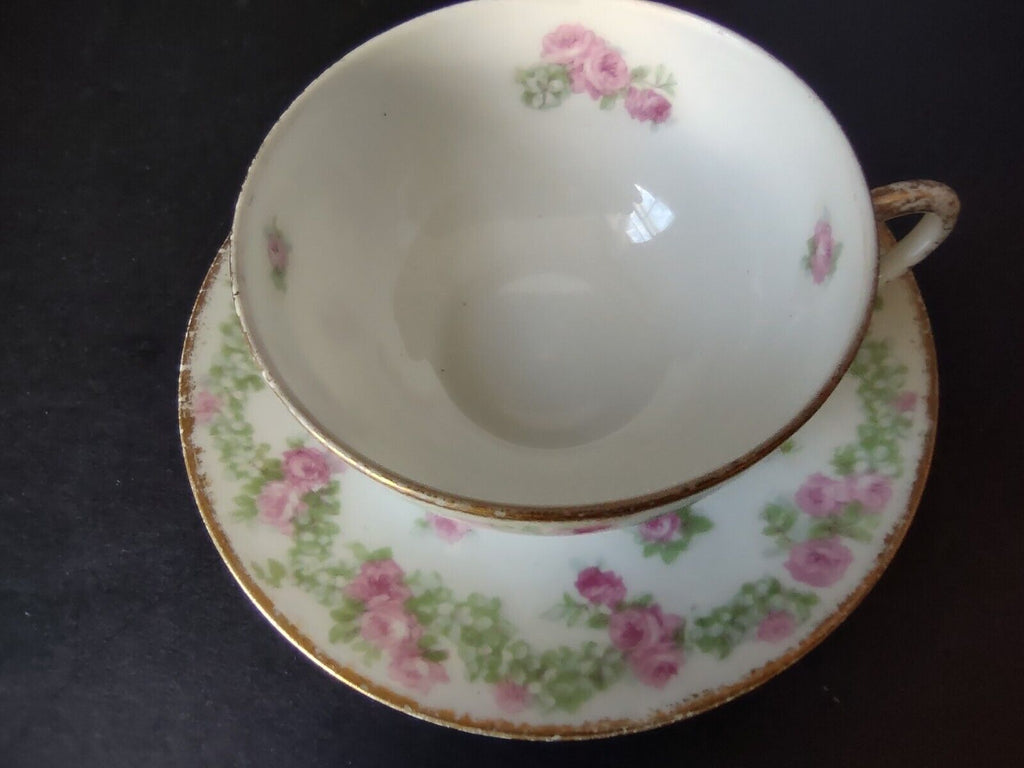 JP France Porcelain for T.G. Evans Tea Cup and Saucer Rose Garland (lot 833)