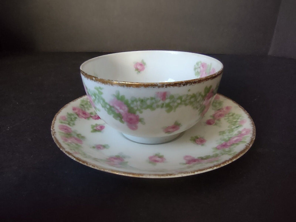 JP France Porcelain for T.G. Evans Tea Cup and Saucer Rose Garland (lot 833)