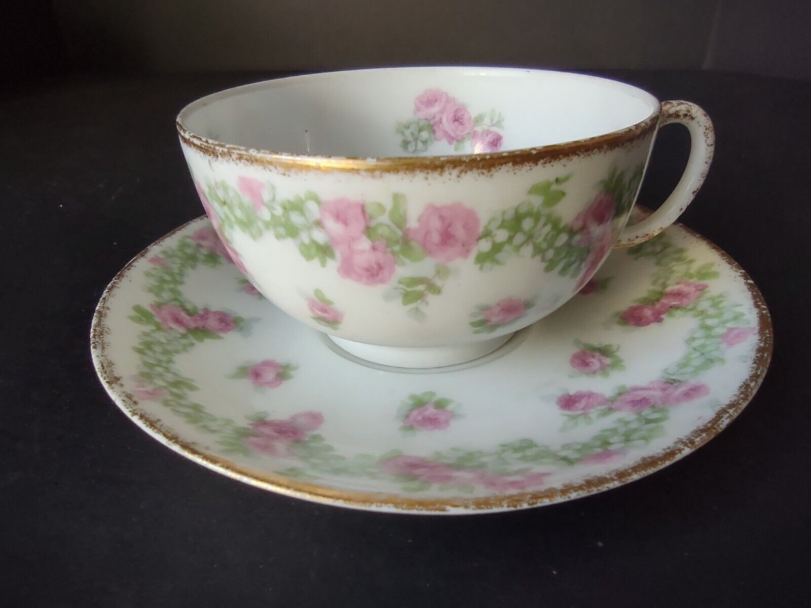 JP France Porcelain for T.G. Evans Tea Cup and Saucer Rose Garland (lot 833)
