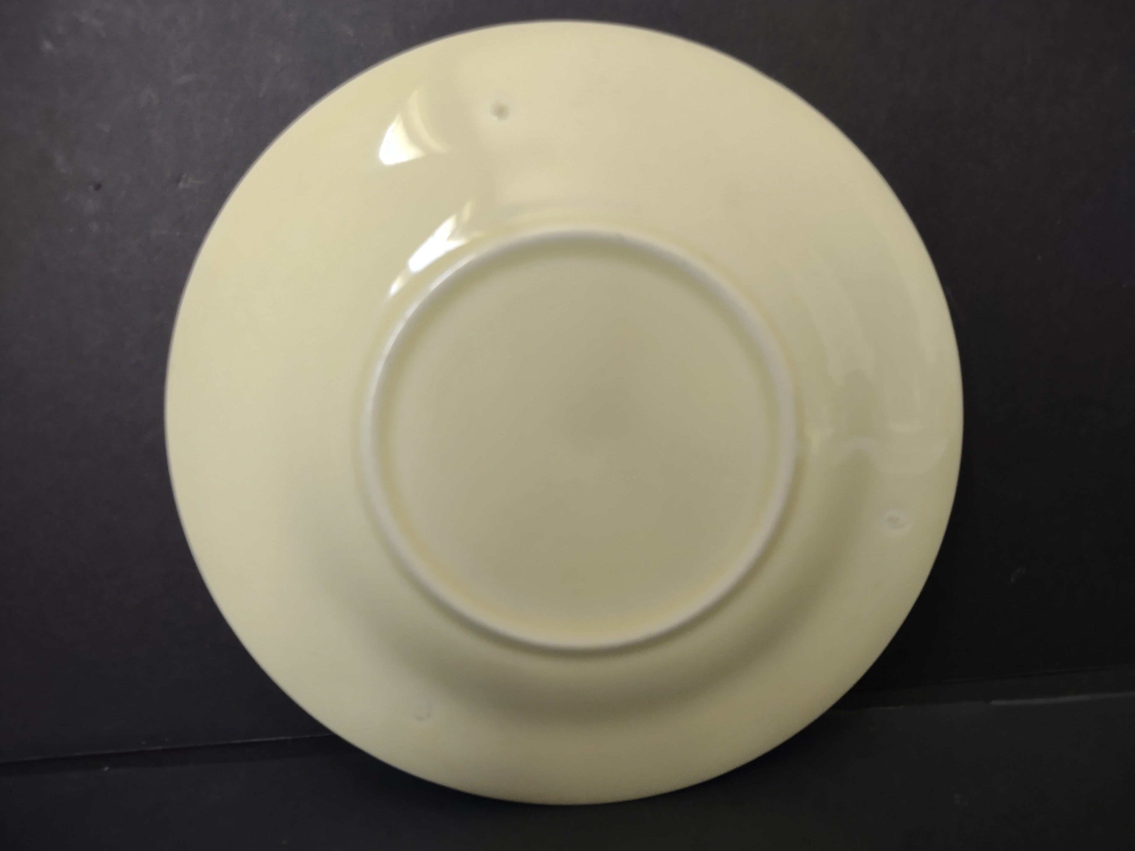 Vintage off-white undecorated plain saucer 5.5" - bottom view