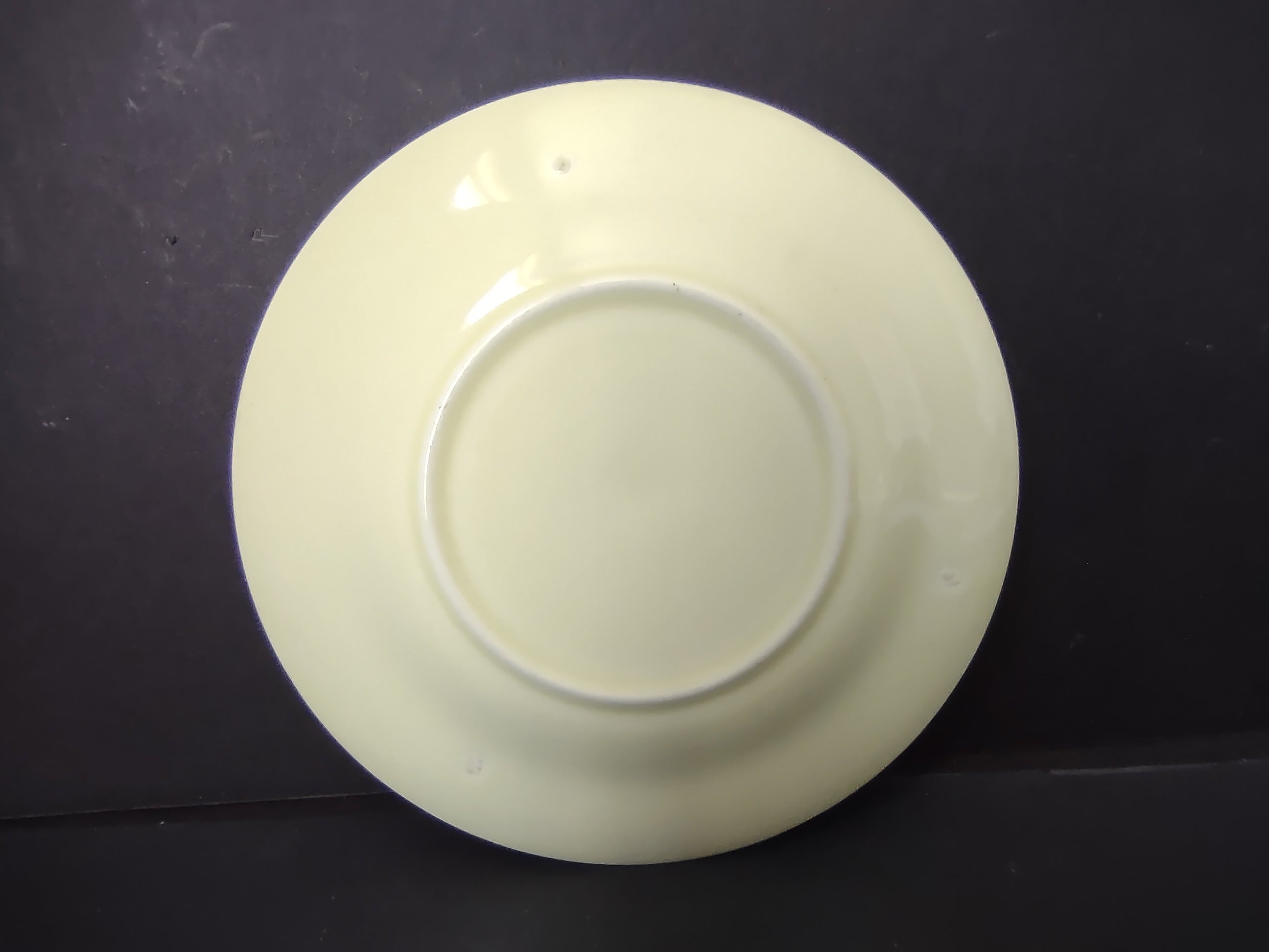 Vintage off-white undecorated plain saucer 5.5" - back view