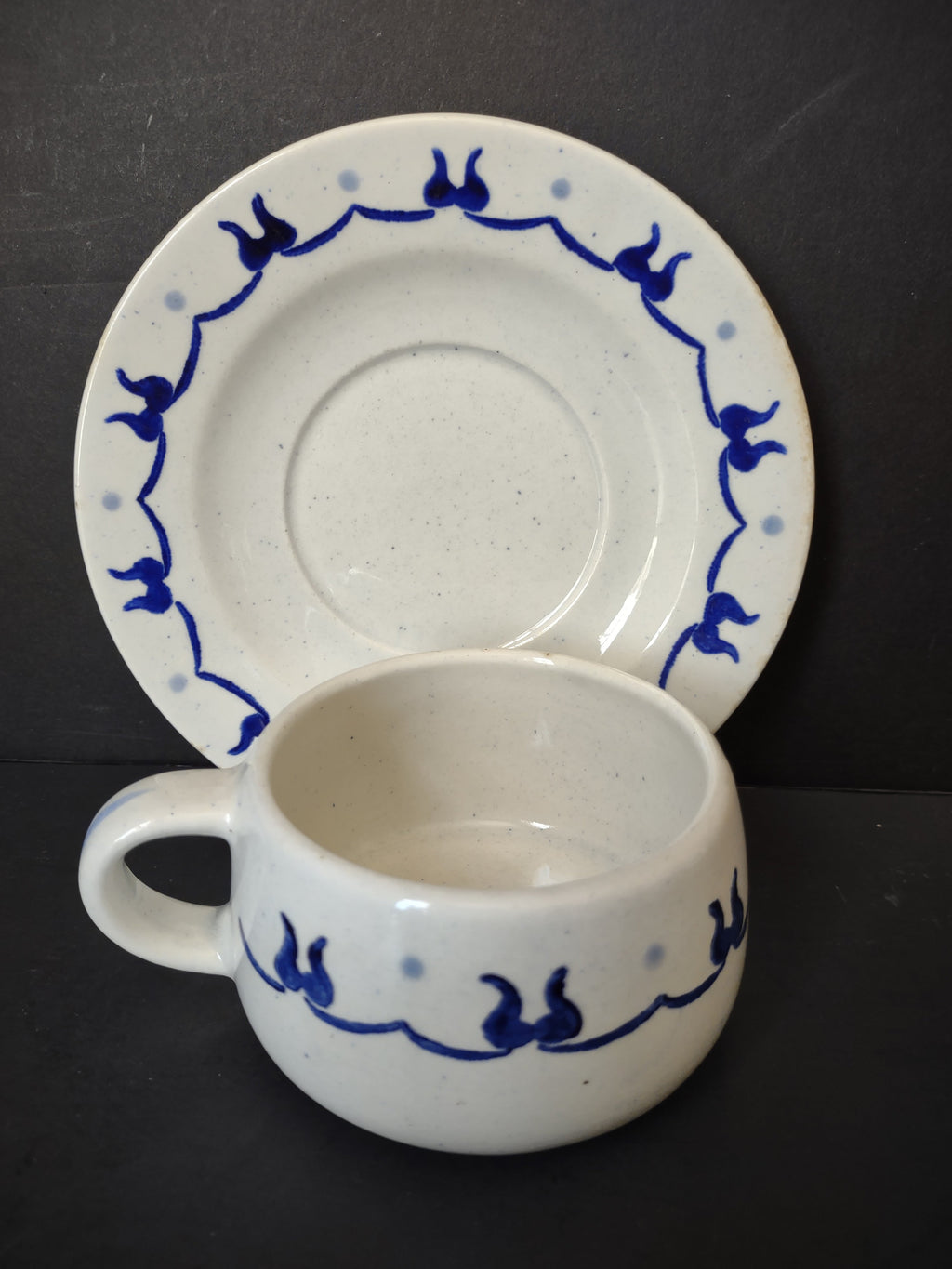 Vintage Metlox Poppytrail Homestead Provincial Cup and Saucer Set - front view showing cobalt blue tulip vine border