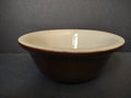 Vintage Bel-Terr USA brown stoneware mixing bowl, side view showing brown exterior and off-white interior