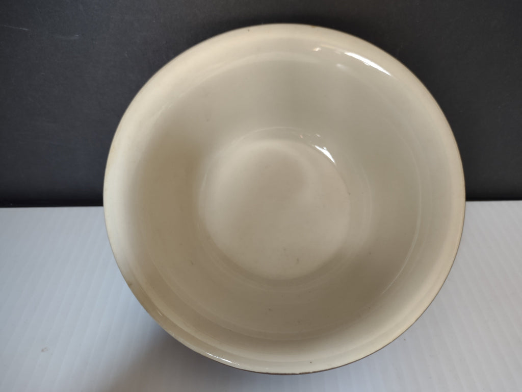 Bottom of Bel-Terr USA stoneware bowl showing maker's mark stamp