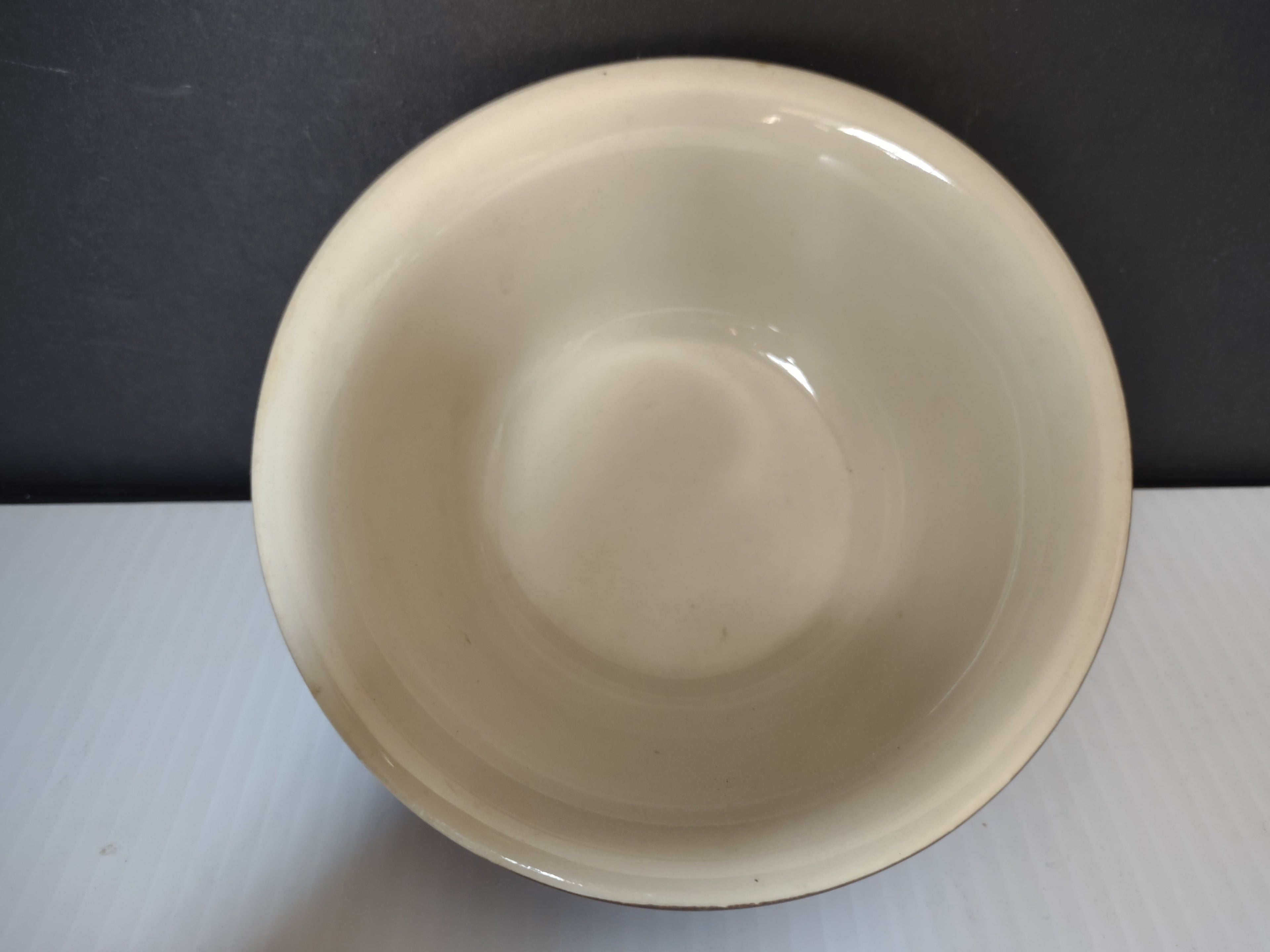 Bottom of Bel-Terr USA stoneware bowl showing maker's mark stamp