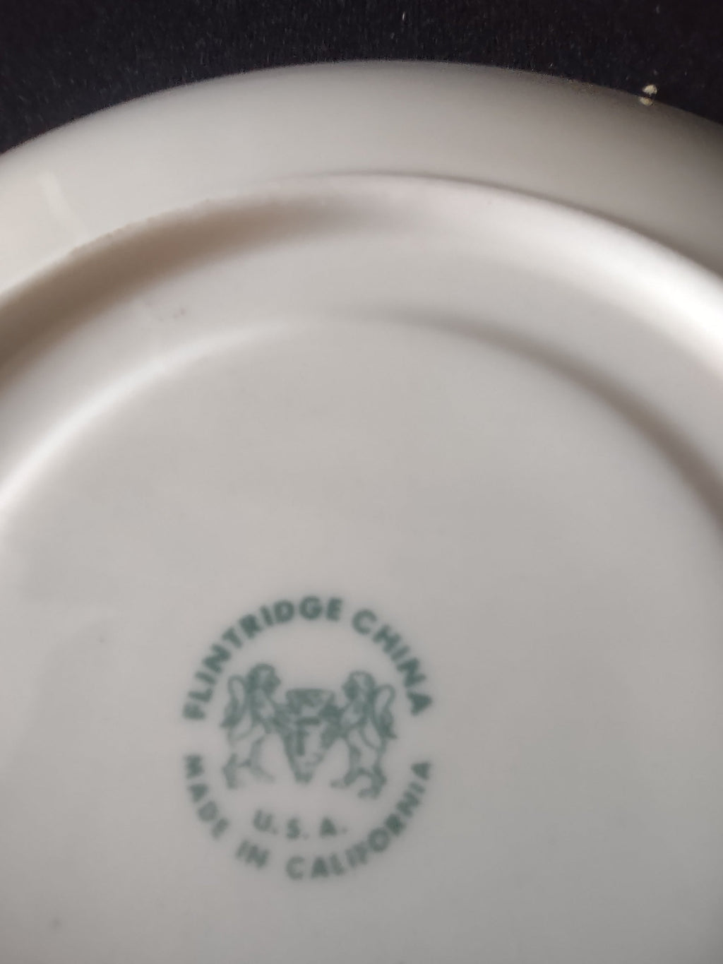 Vintage Flintridge China celadon green gold rim saucer - top view with ruler showing 5 inch diameter