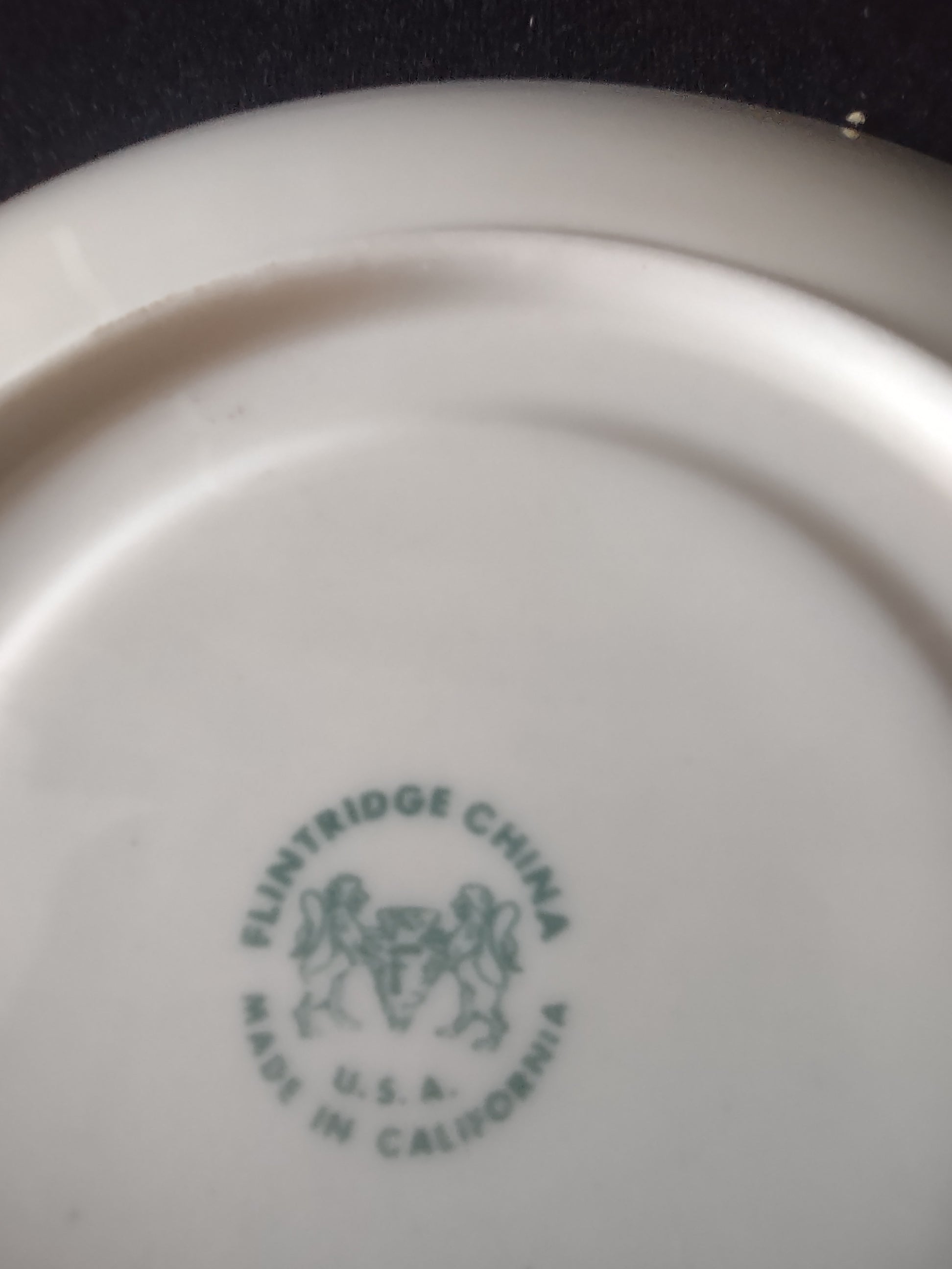 Vintage Flintridge China celadon green gold rim saucer - top view with ruler showing 5 inch diameter