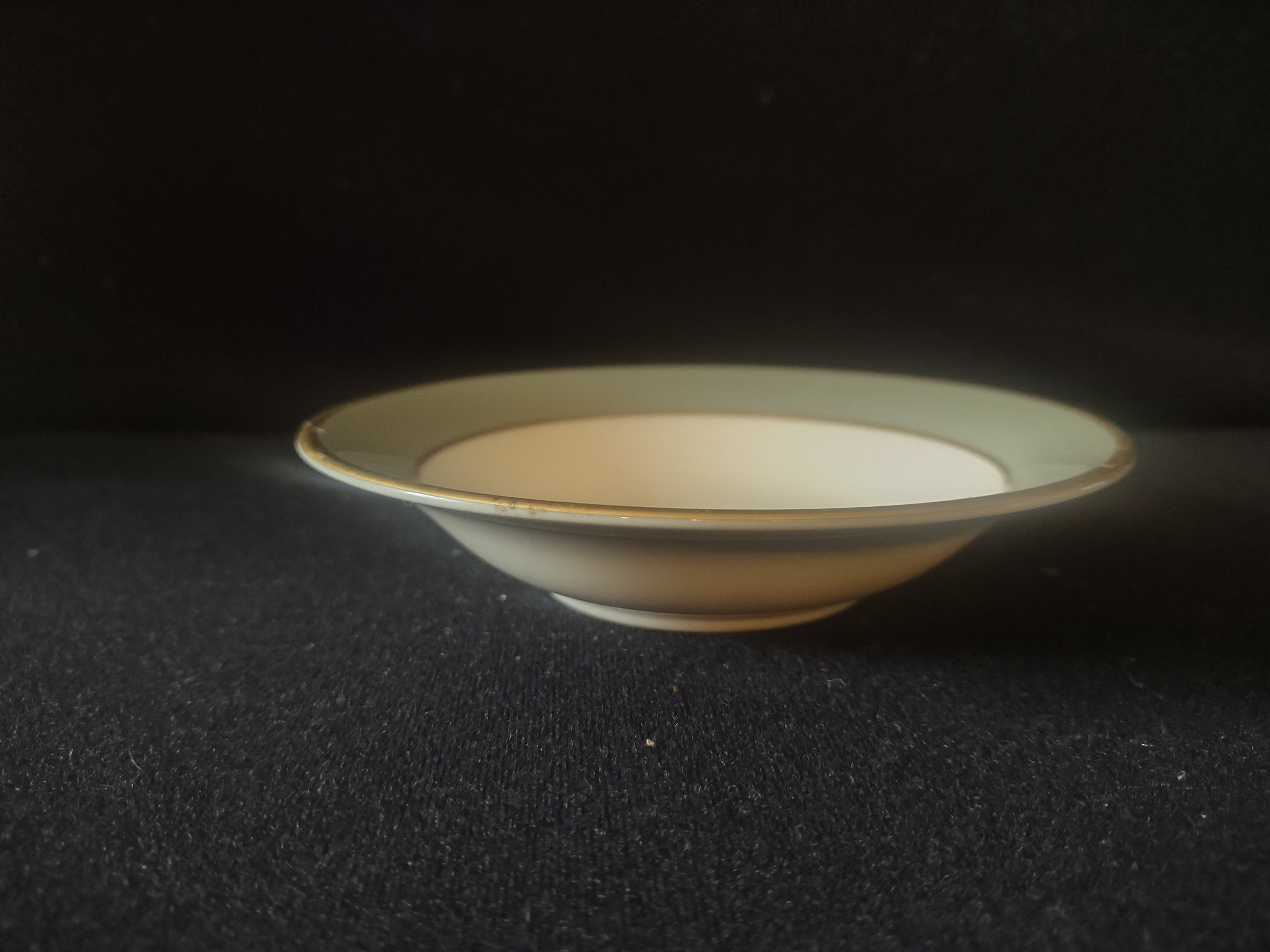 Vintage Flintridge China celadon green floral fruit bowl - side profile view showing depth and gold rim