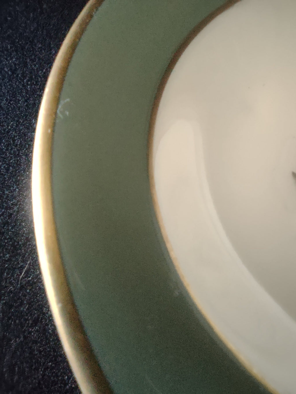Vintage Flintridge China celadon green floral fruit bowl - close-up of gold rim wear detail