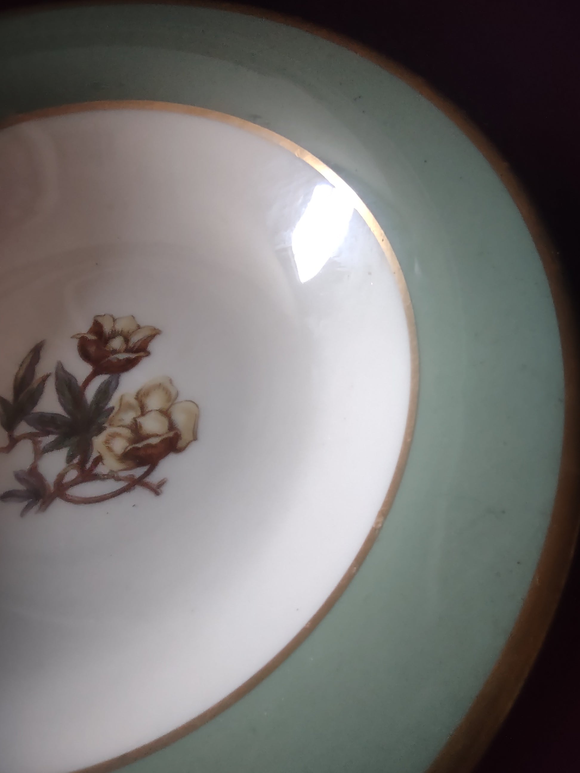 Vintage Flintridge China celadon green floral fruit bowl - close-up of central off-white rose floral motif