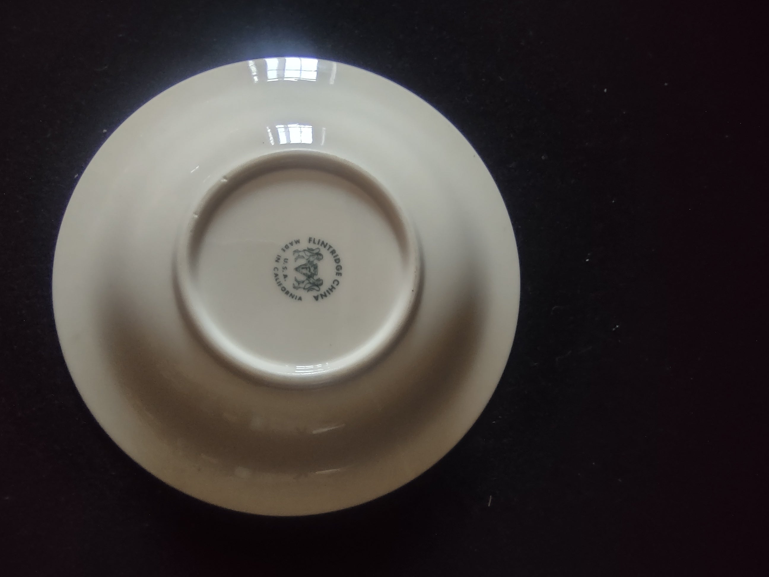 Vintage Flintridge China celadon green floral fruit bowl - close-up of celadon green border and gold rim