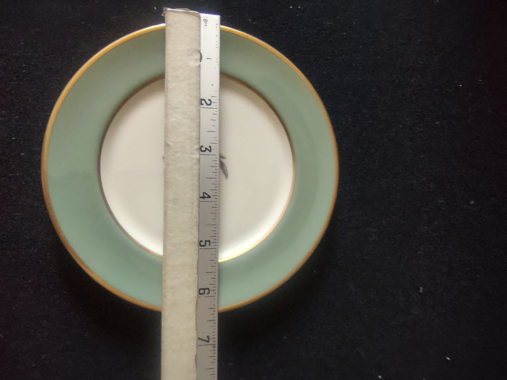 Vintage Flintridge China celadon green floral plate - close-up of off-white and brown rose floral motif with dark leaves