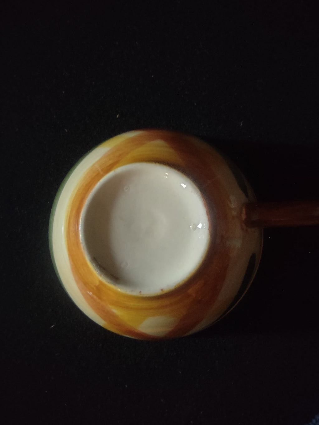 Vernon Kilns Homespun cup side view showing plaid pattern and rust handle