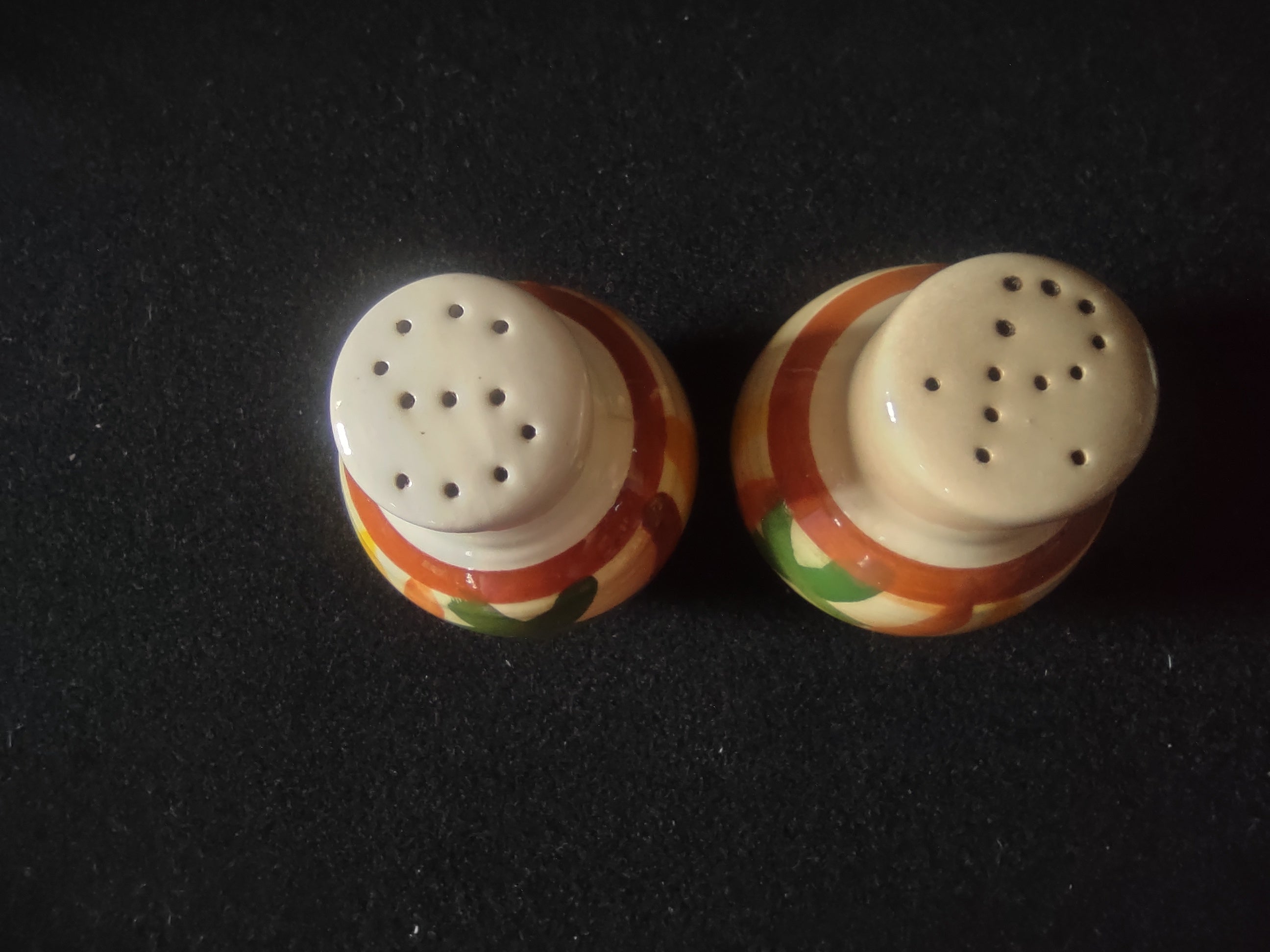 Vintage Vintonware Salt & Pepper Shakers side view showing full body decoration and off-white tops