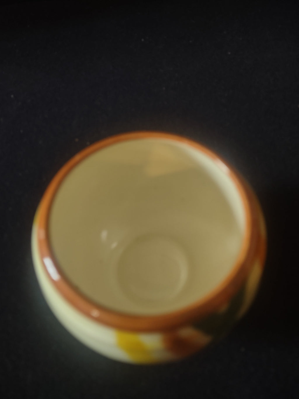 Vintage Vernonware Open Sugar Bowl front view showing orange green yellow diagonal brushstroke bands
