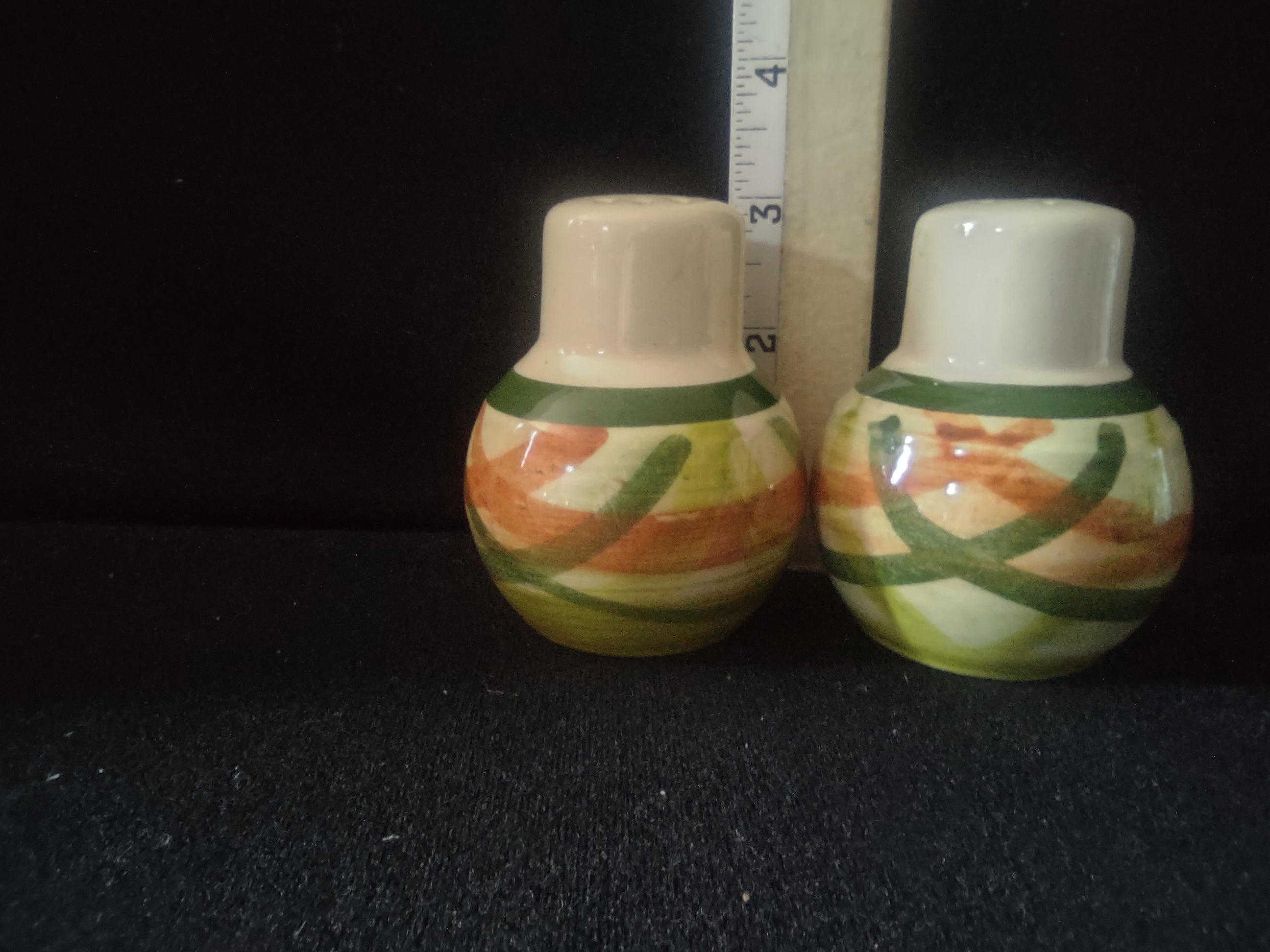 Vernonware Tam O'Shanter salt and pepper shakers side view showing striped green and orange banding