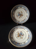 Coxon Belleek Boulevard saucer close-up of orange and blue floral center bouquet