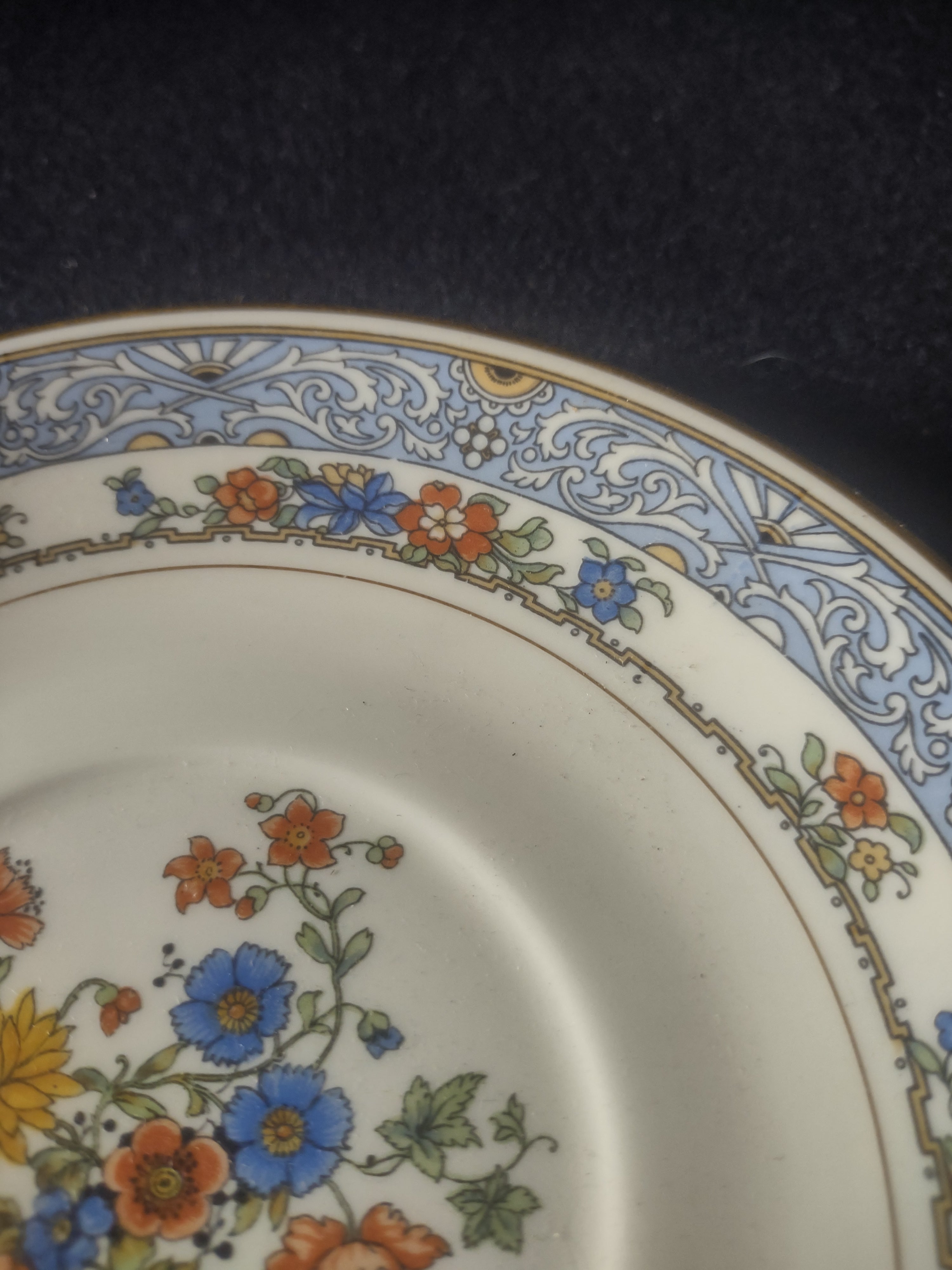 Coxon Belleek Boulevard saucer set of 2 front view on display