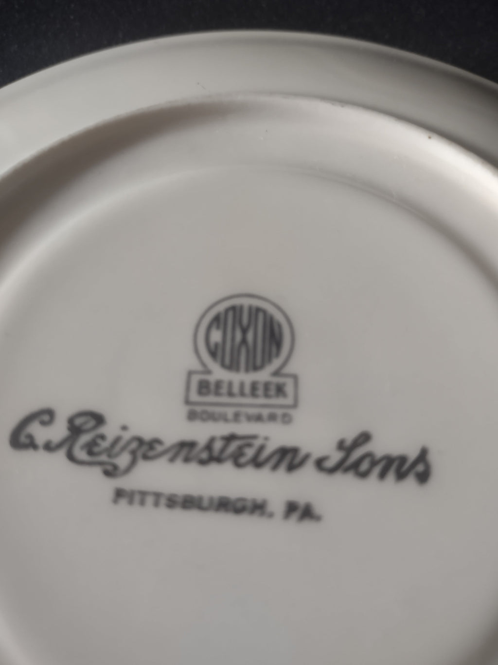 Coxon Belleek Boulevard saucer with ruler showing 6 inch diameter
