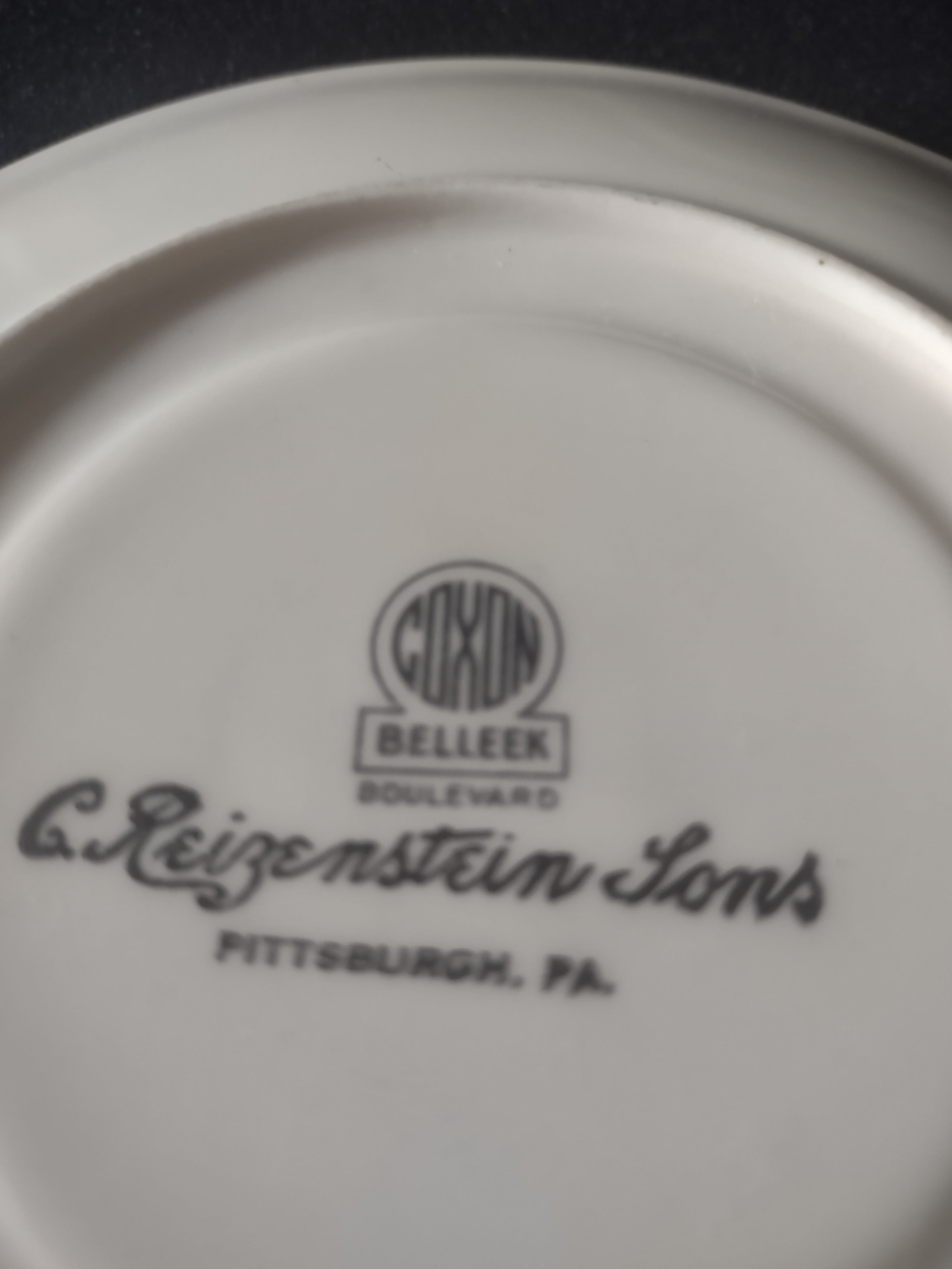 Coxon Belleek Boulevard saucer with ruler showing 6 inch diameter