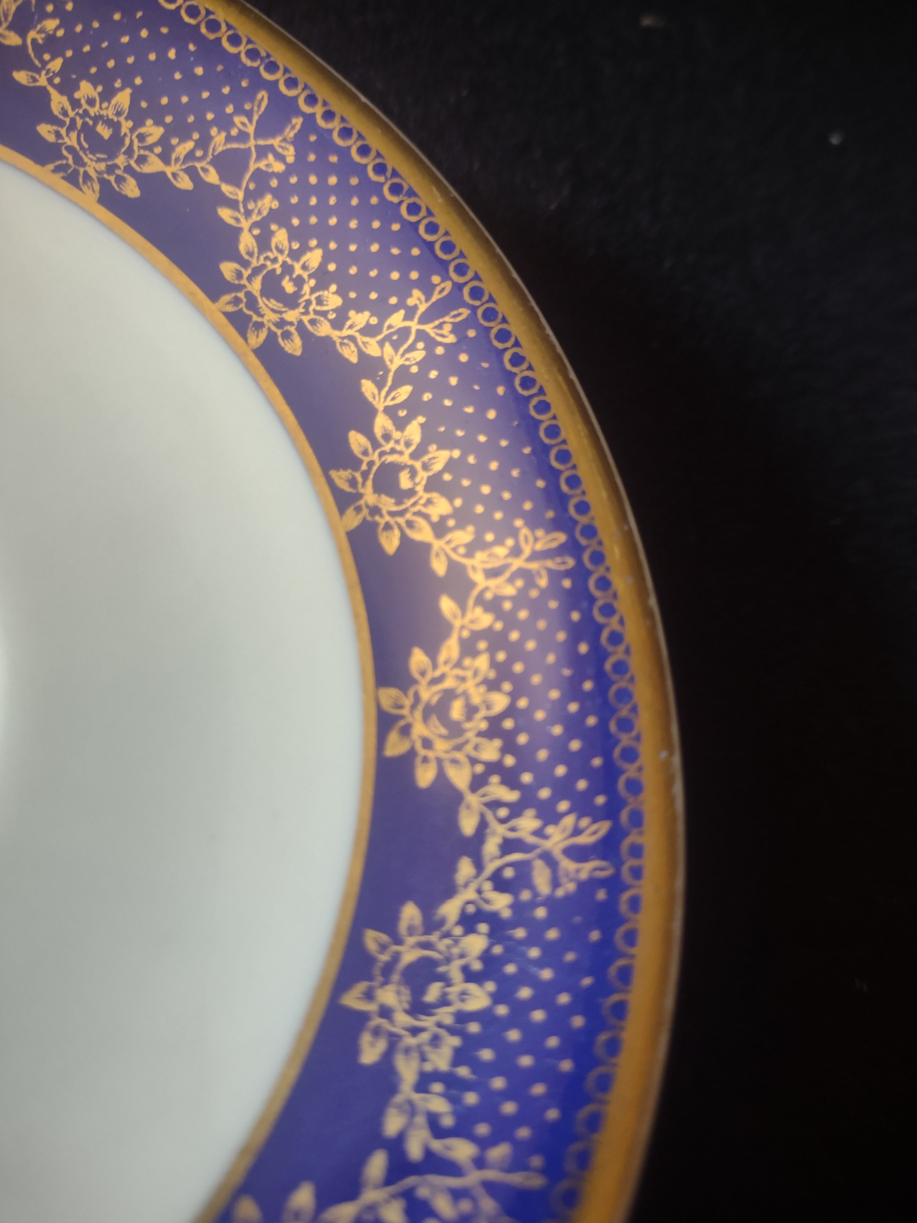 Saucer measuring approximately 6 inches diameter with ruler