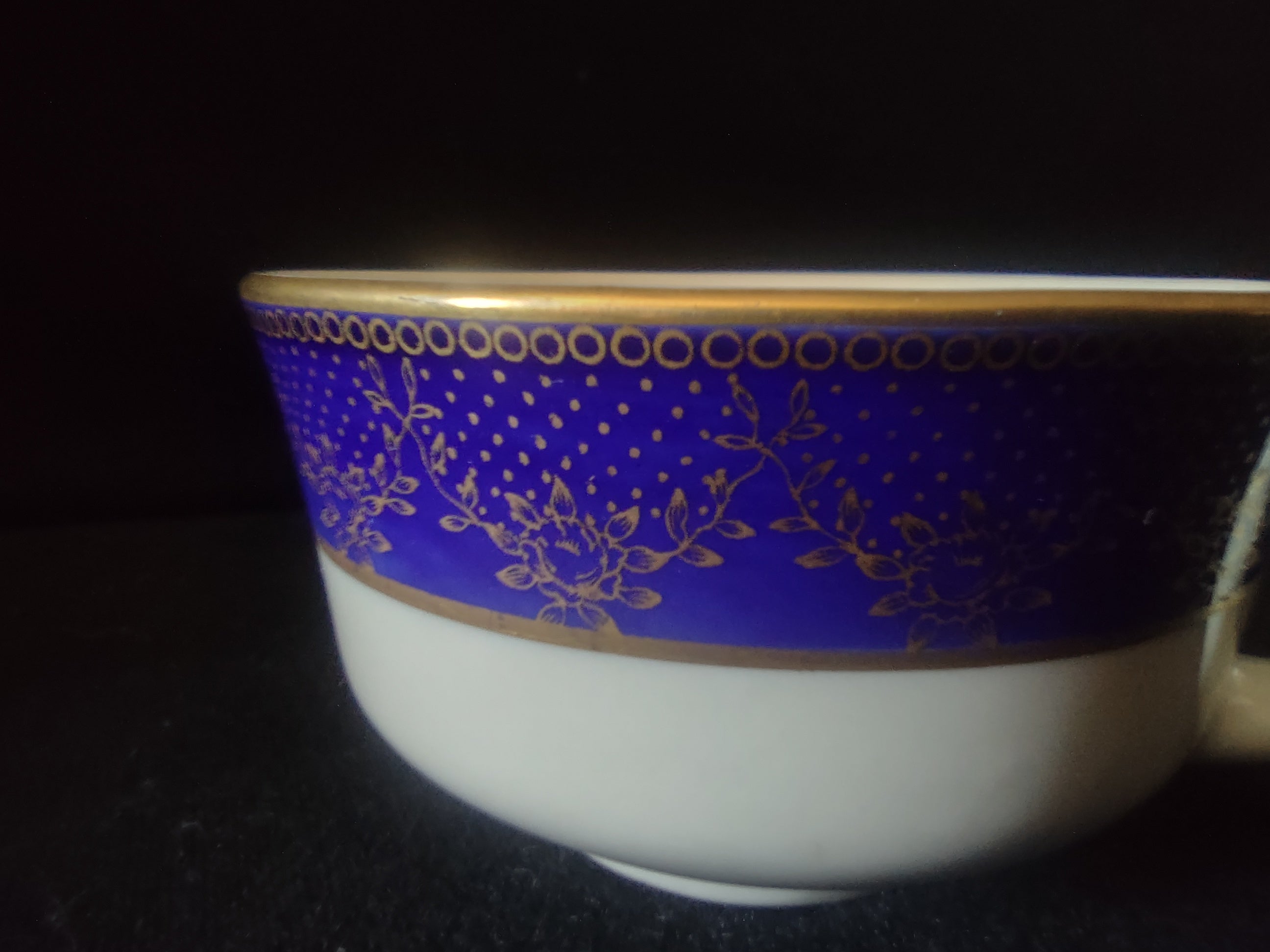Set of 2 cups and saucers, cobalt blue and gold, front view