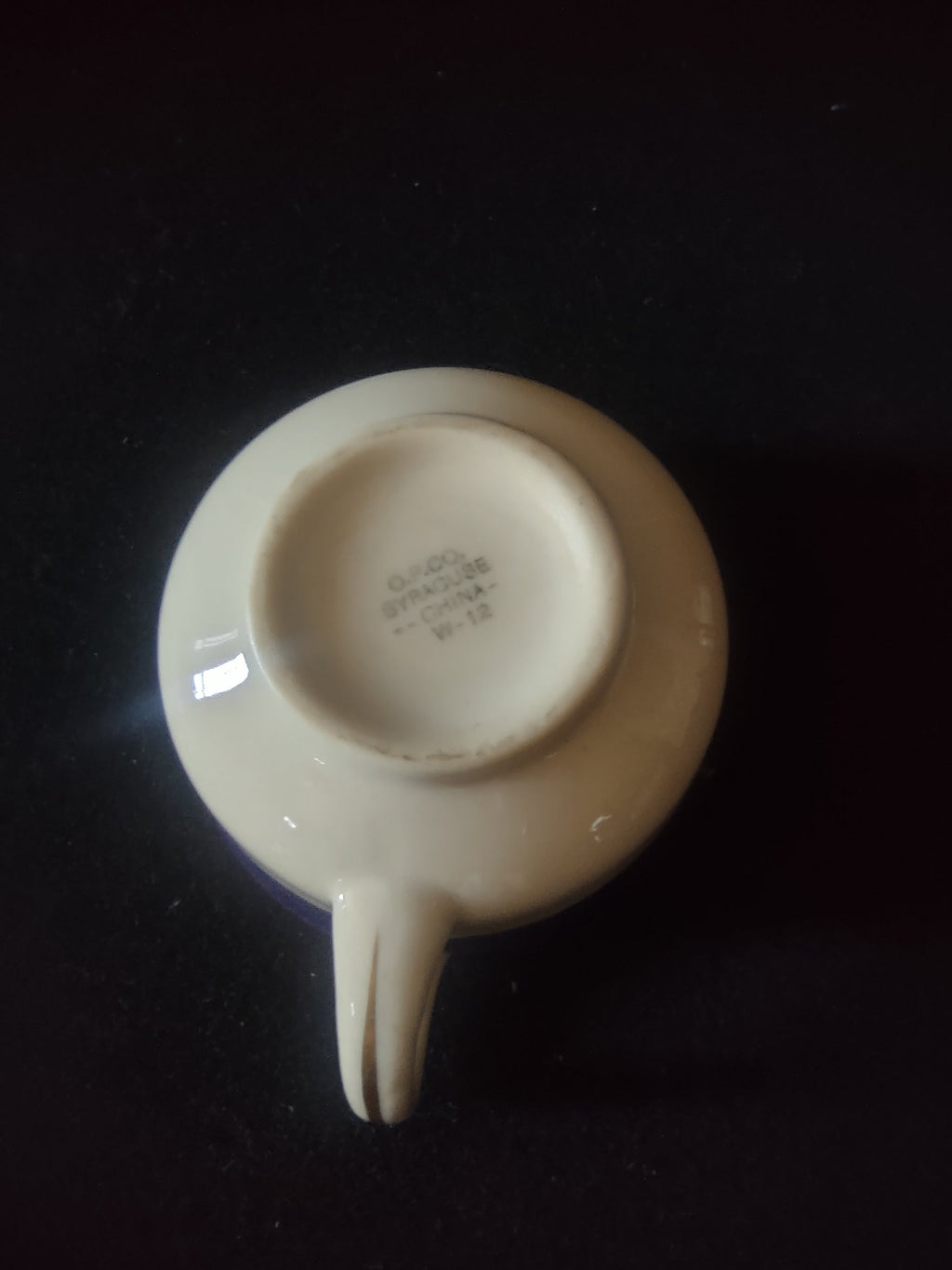 Cup and saucer set side view