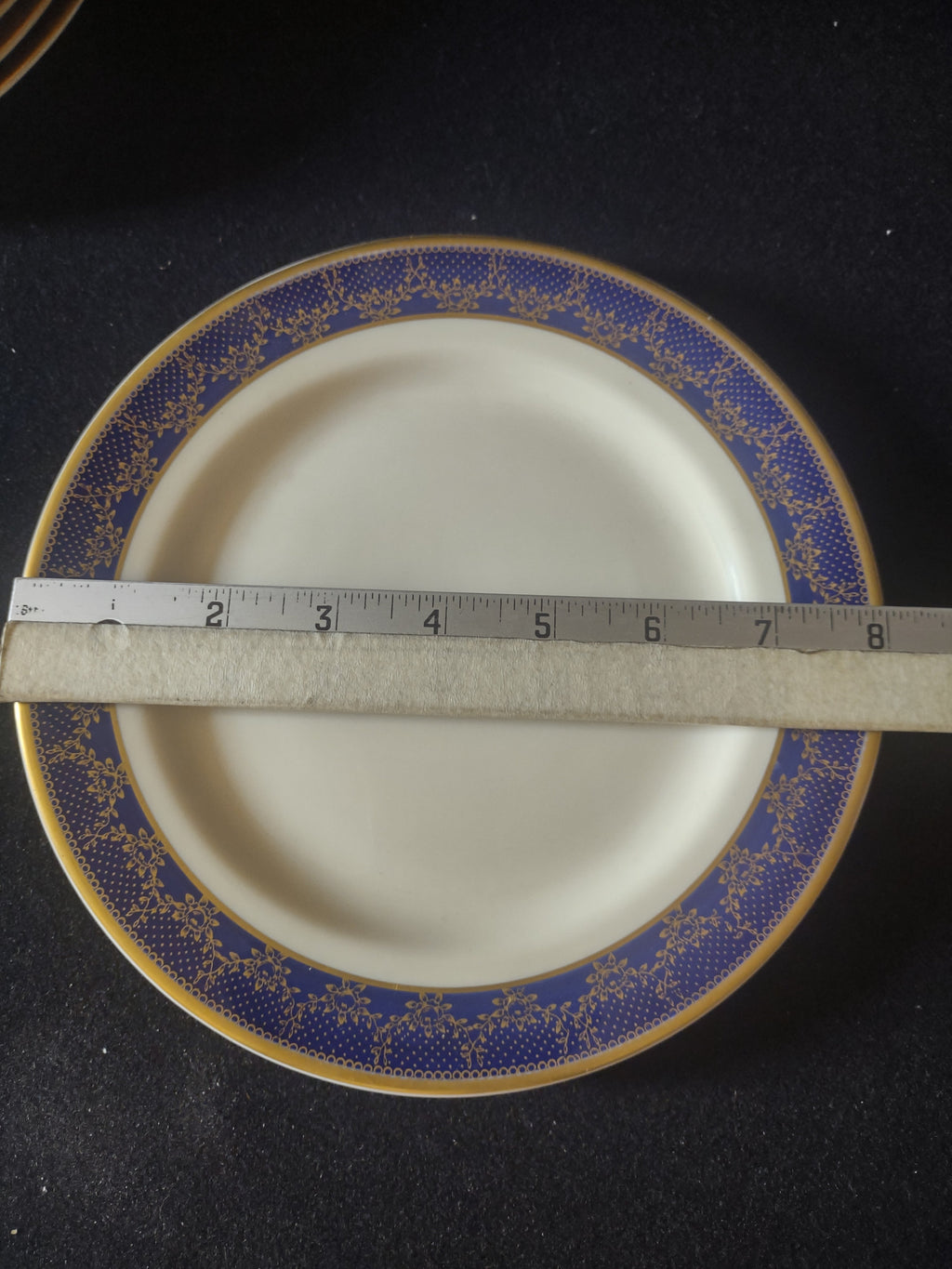Back of plate showing Syracuse China Old Ivory OPCo Made in America backstamp