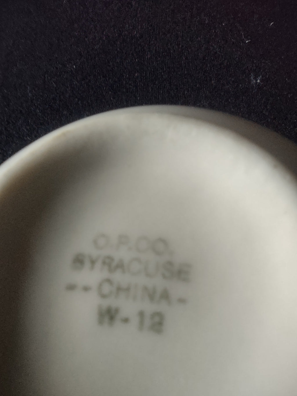 Vintage O.P.Co. Syracuse China W-12 backstamp close-up showing O.P.CO. Syracuse China W-12