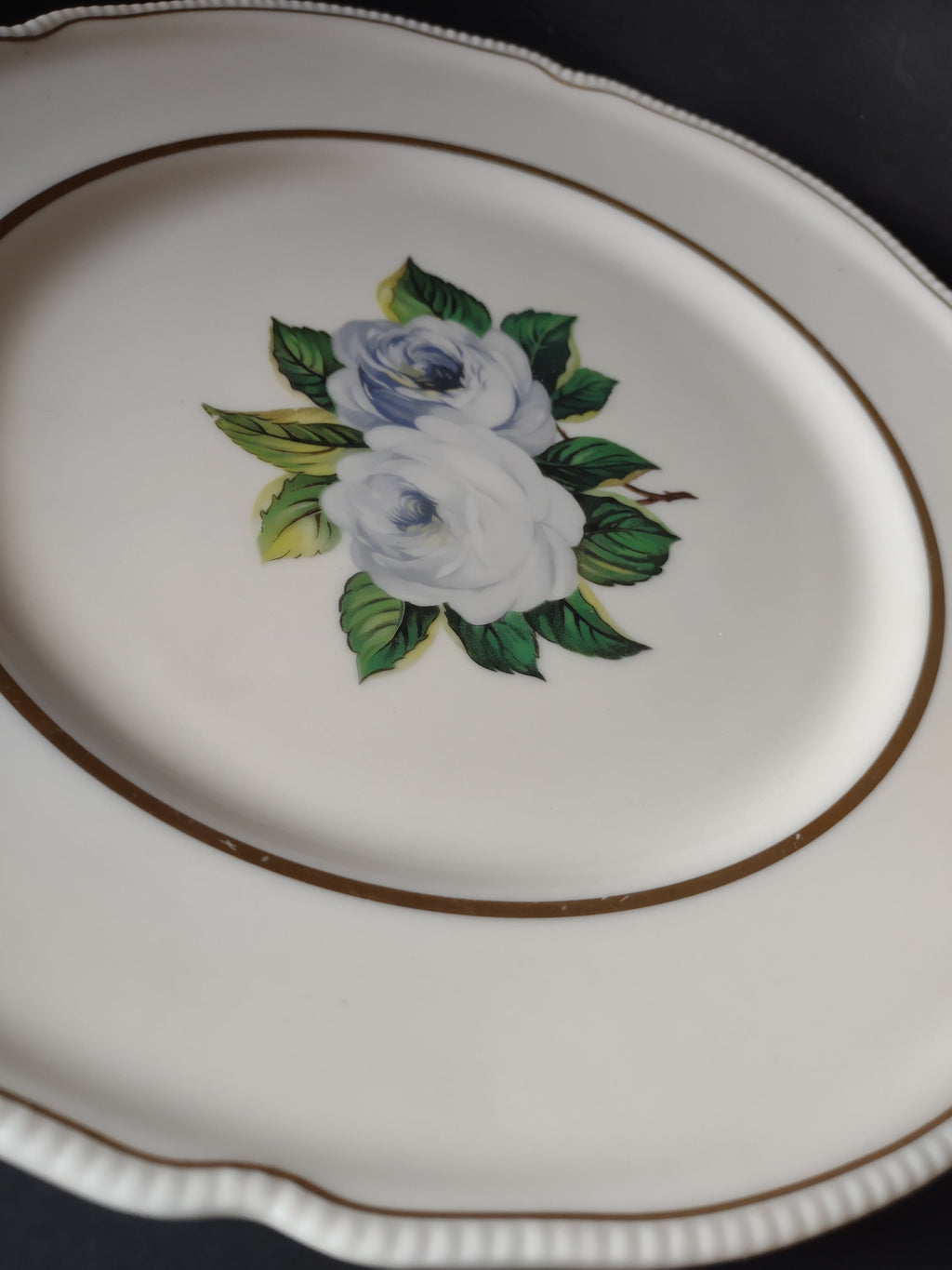 Castleton China York Rose plate with ruler showing approximately 9.5 inch diameter