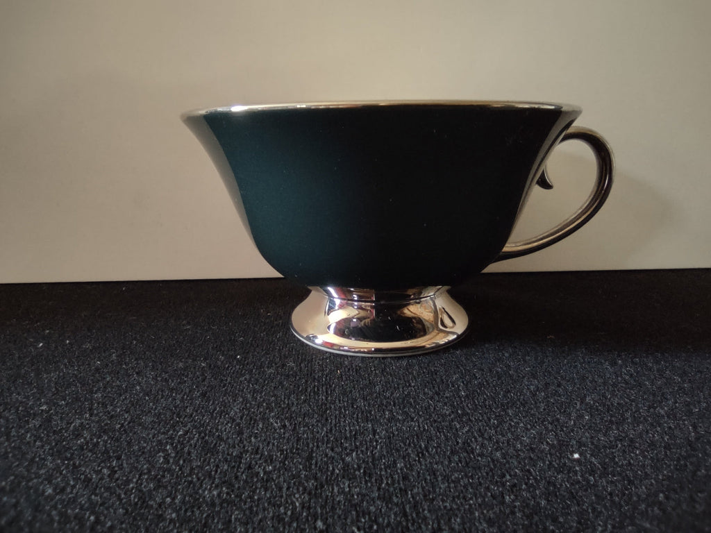 Flintridge China teal footed cup full side view showing teal exterior and platinum trim