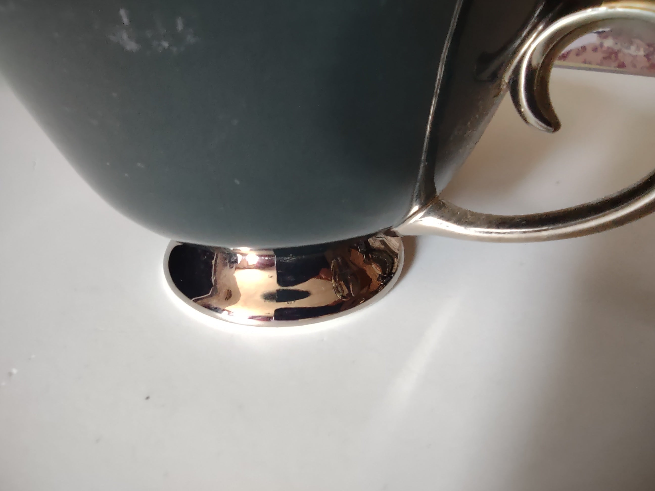 Flintridge China teal footed cup bottom view showing backstamp Made in USA in California