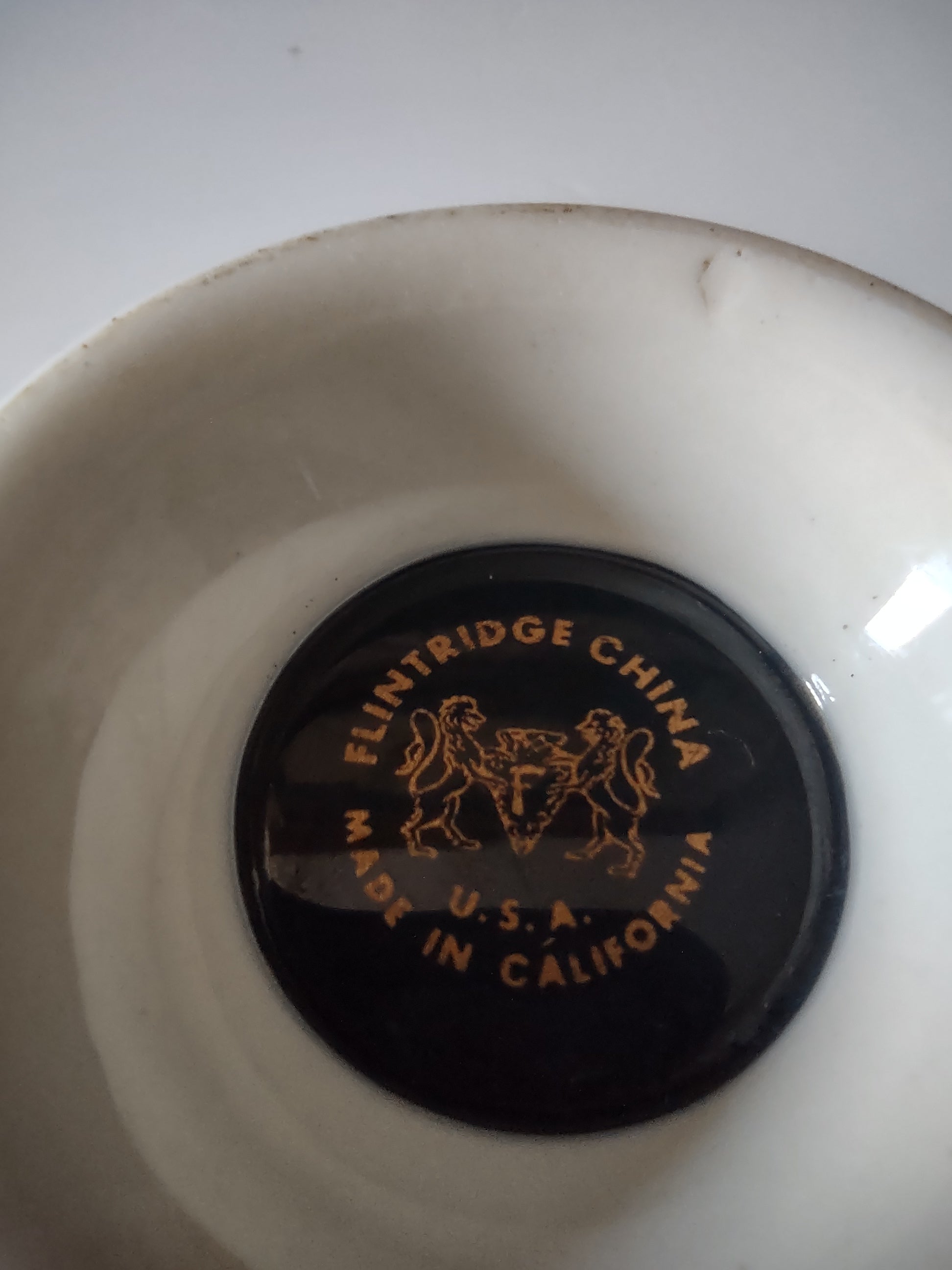 Flintridge China teal footed cup side view with ruler showing approximately 3 inch height