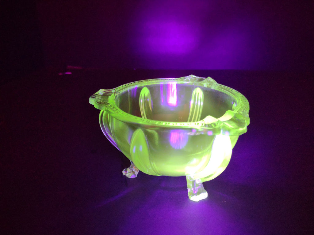 Vintage green uranium glass footed bowl close-up detail of scalloped beaded rim