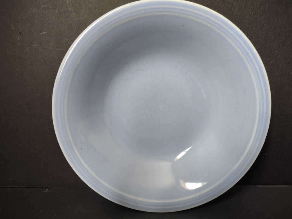 Vintage Russel Wright American Modern ice blue coupe soup bowl back view showing plain glaze and foot ring