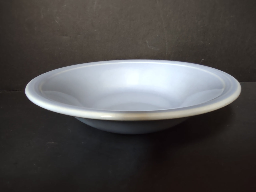 Vintage Russel Wright American Modern ice blue coupe soup bowl side profile view